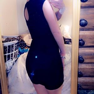 Black tight dress with shirt sleeve top open back